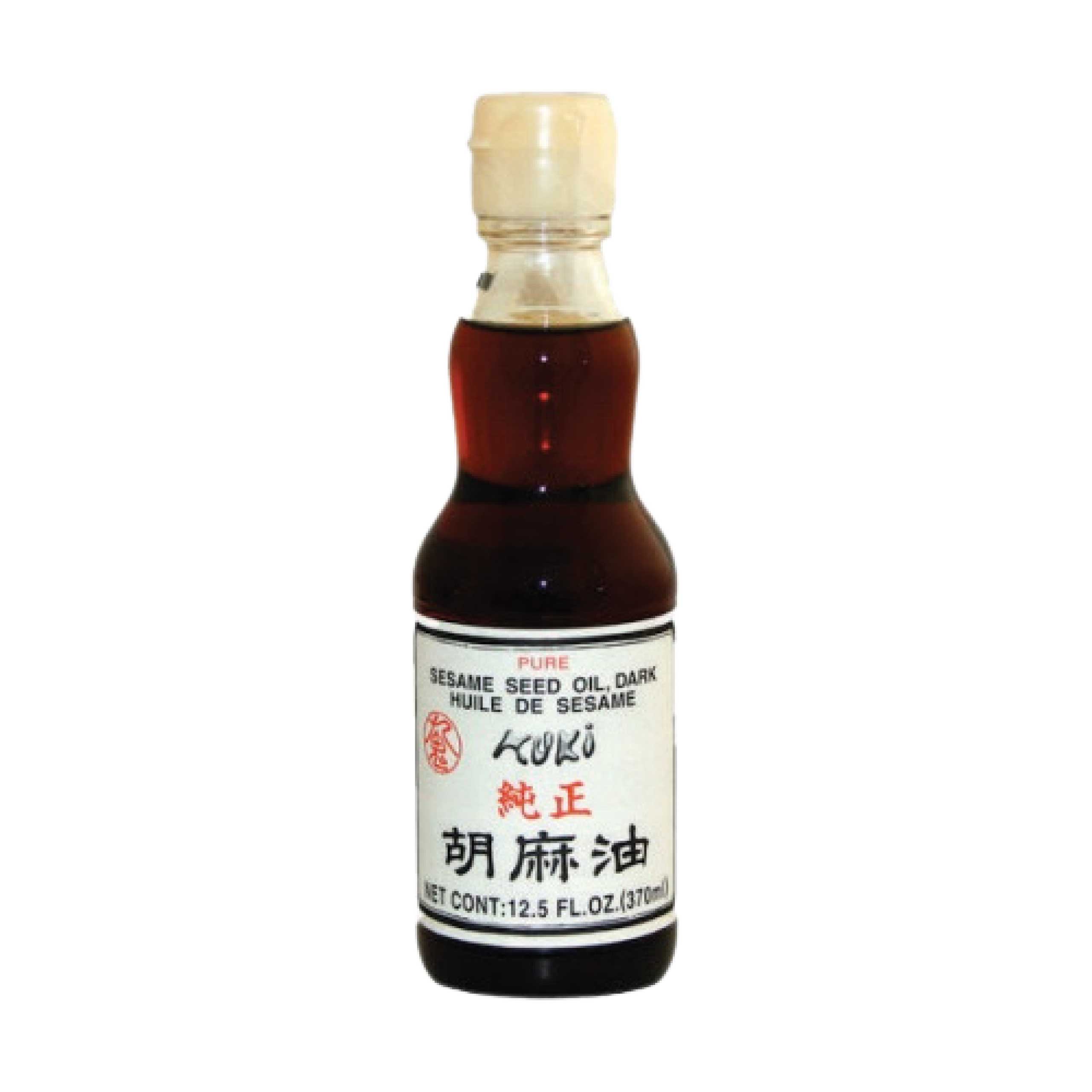 foto a sfondo bianco con l'olio di sesamo kuki
